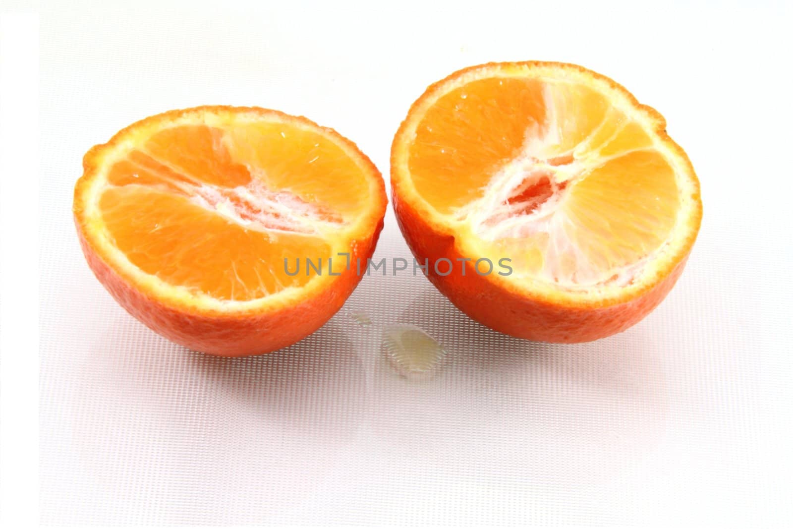 Fresh orange slices isolated on white.