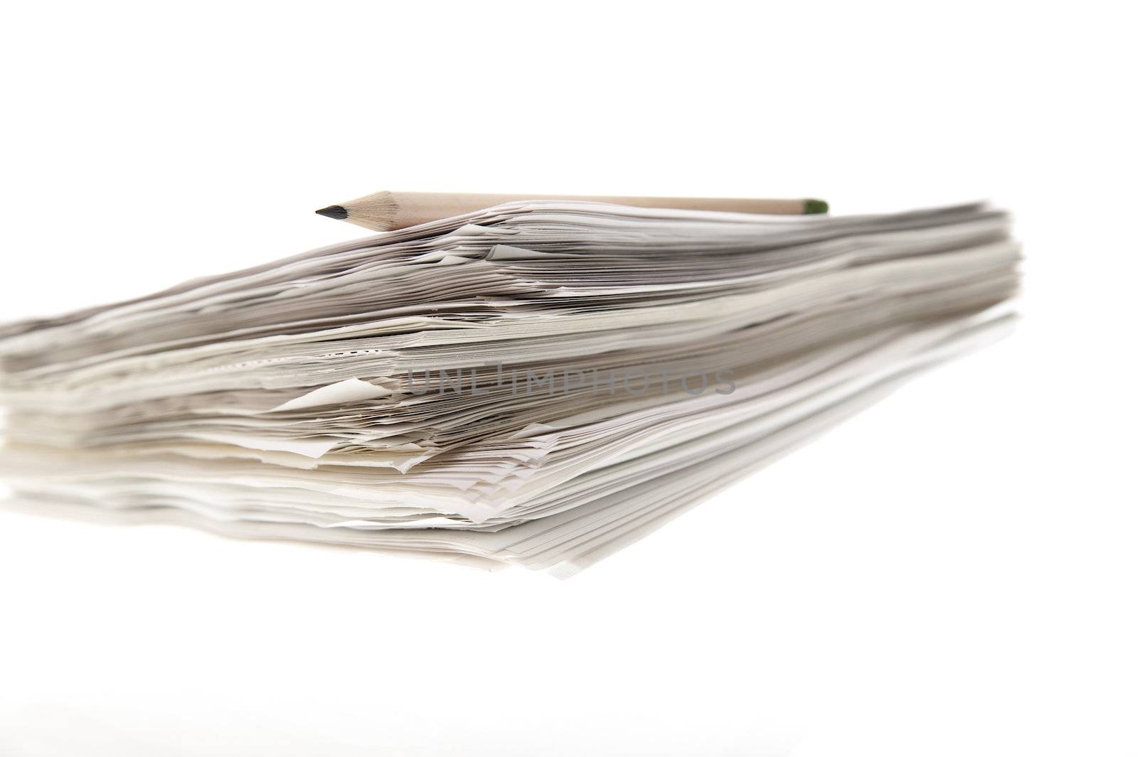 A sheaf of paper stacked randomly.