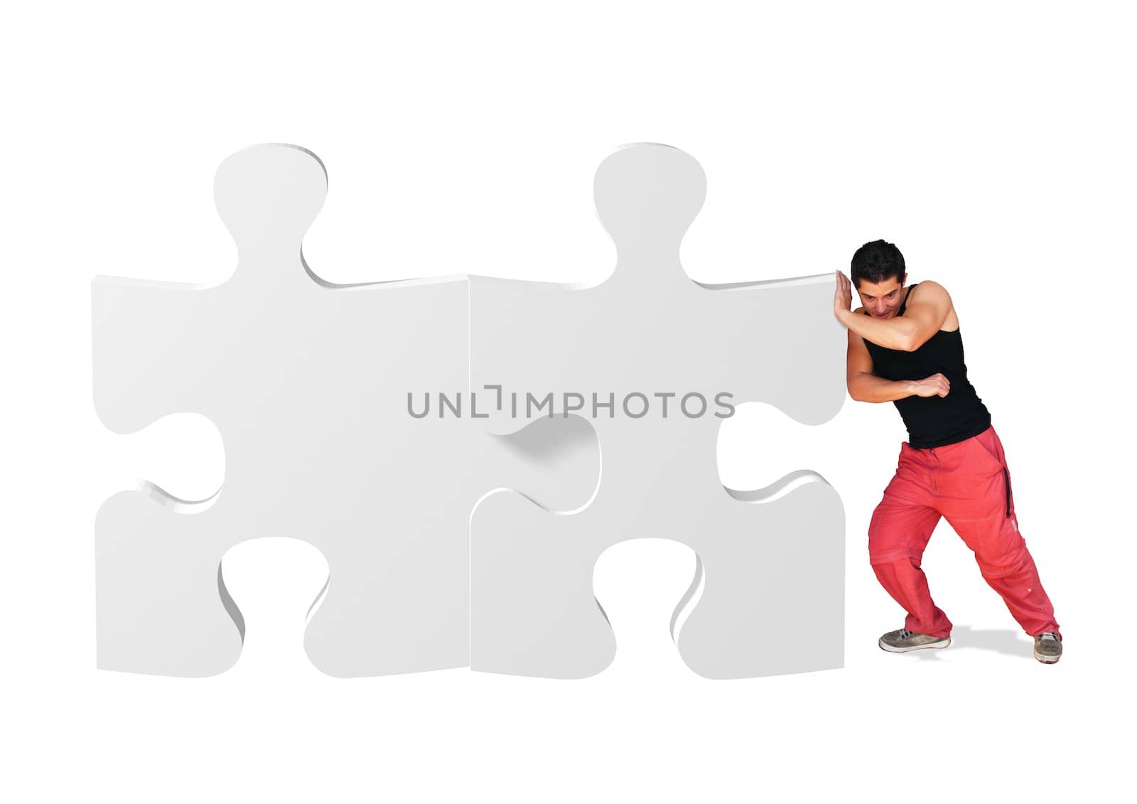 metaphor picture showing a guy moving puzzle pieces, applicable to several concepts