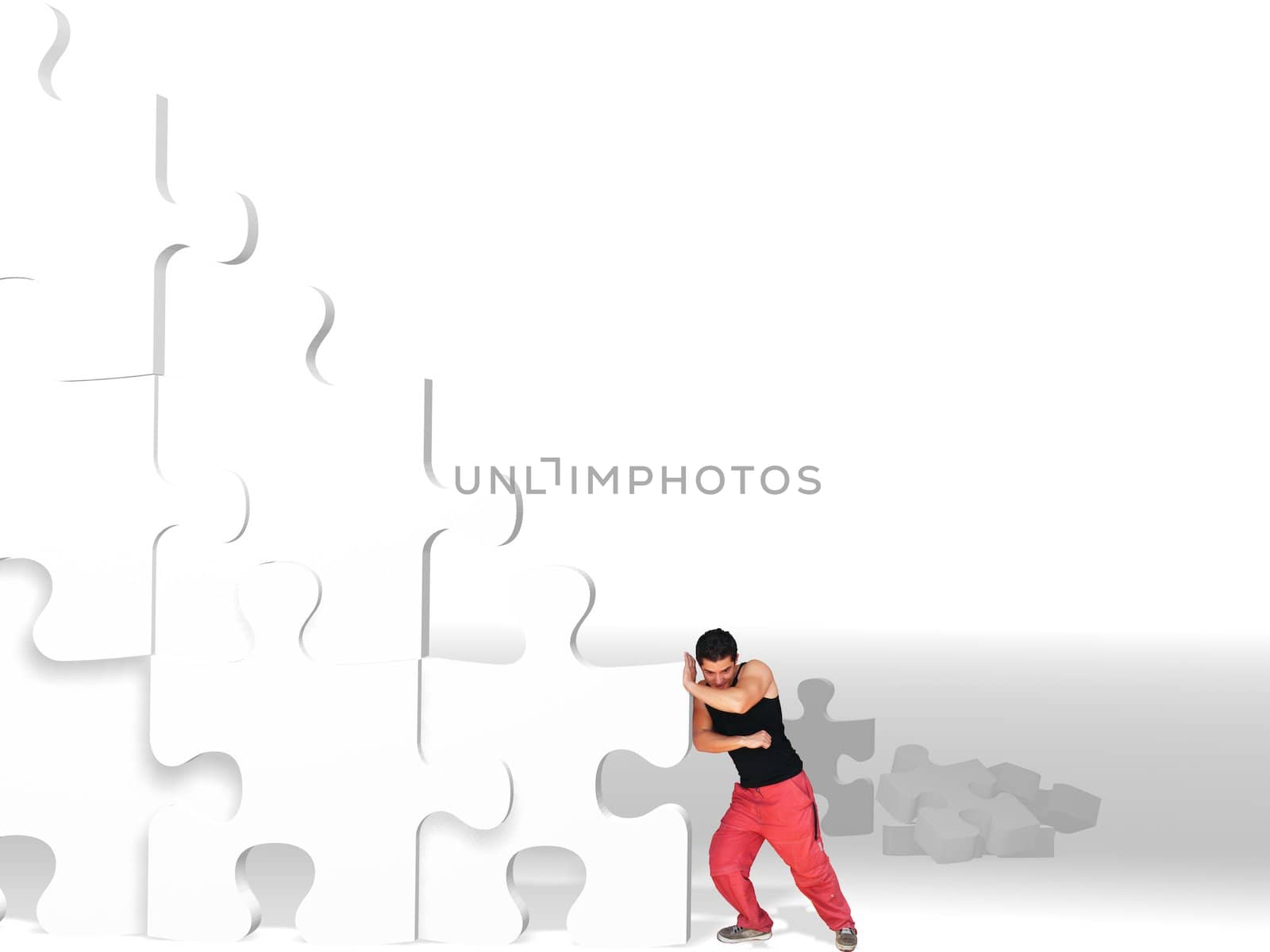 metaphor picture showing a guy moving puzzle pieces, applicable to several concepts