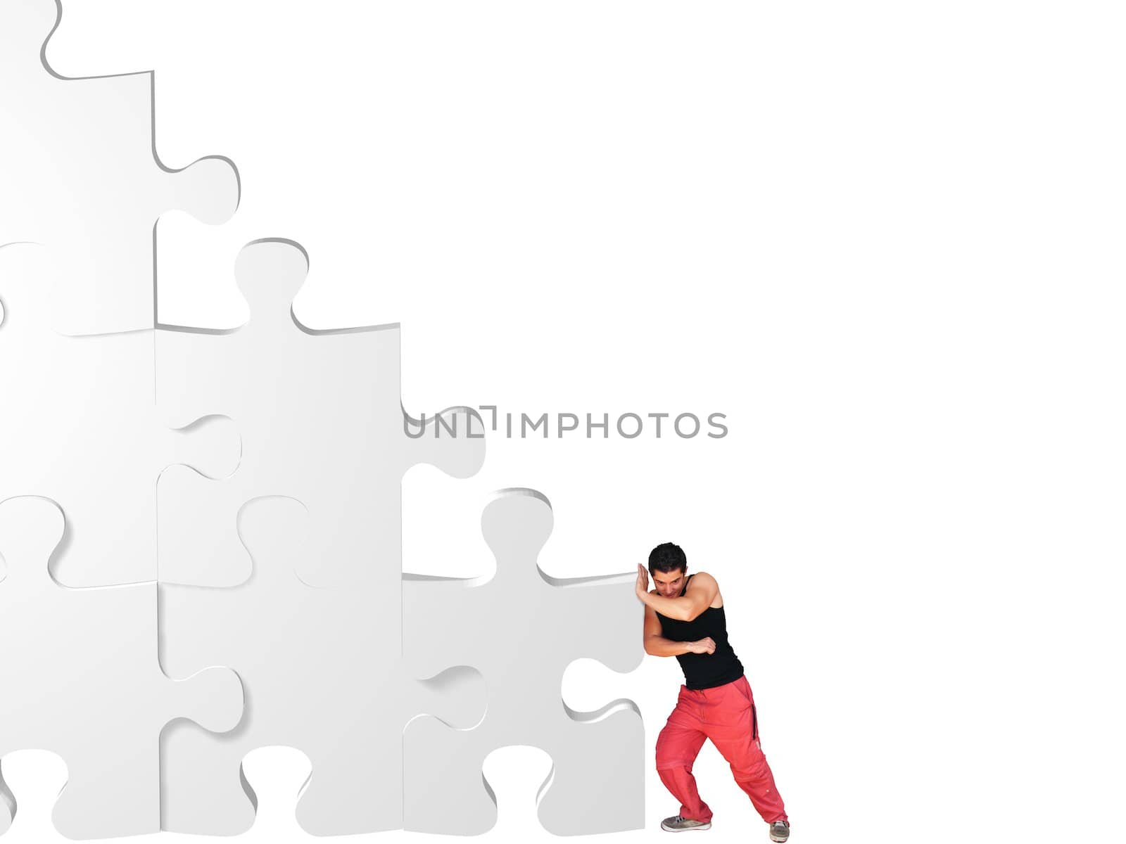 metaphor picture showing a guy moving puzzle pieces, applicable to several concepts