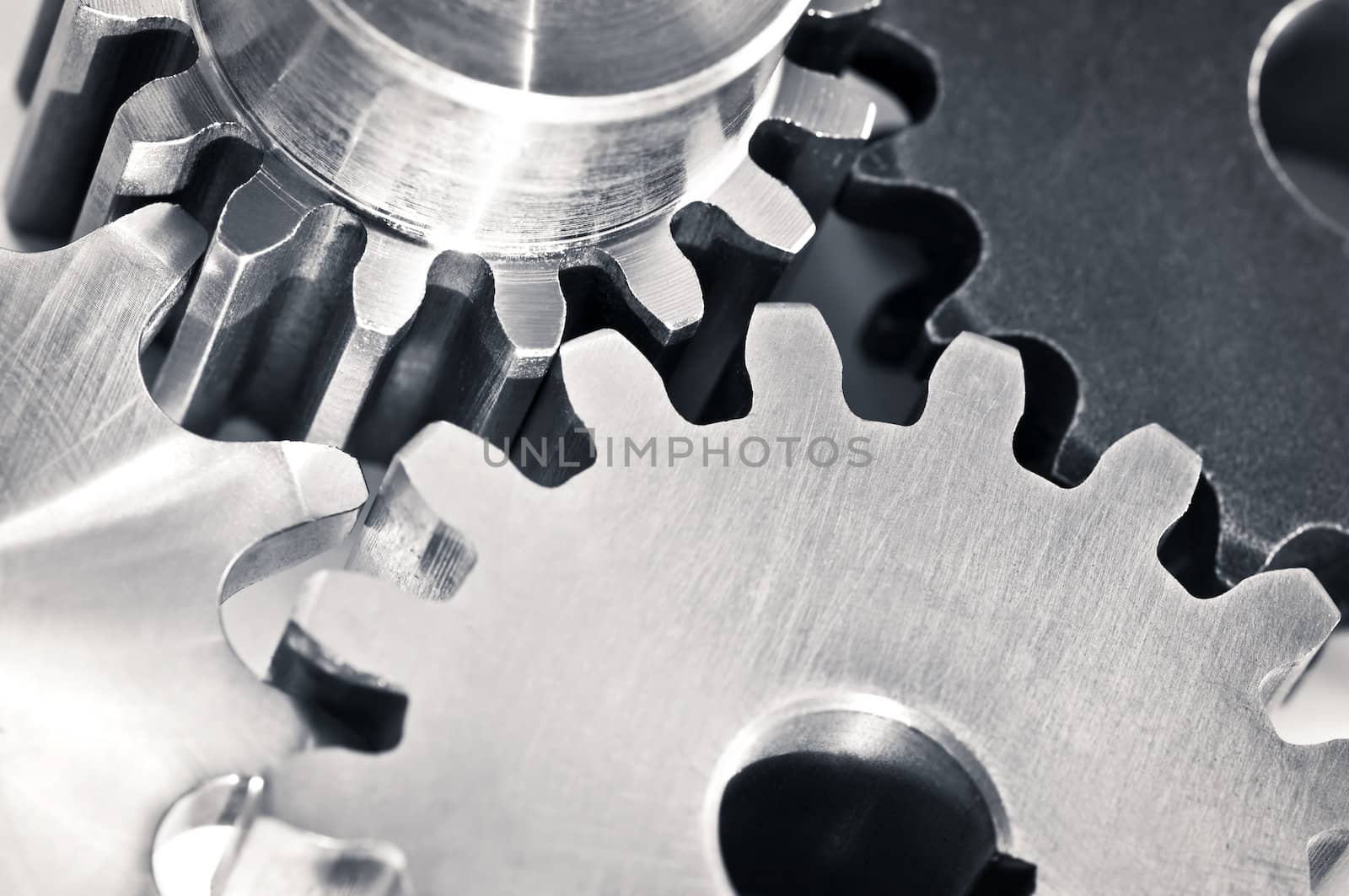Industrial metal gears and machine parts connected
