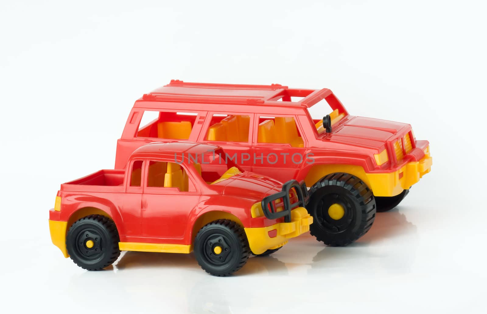 Two toy cars, isolated on a white background.