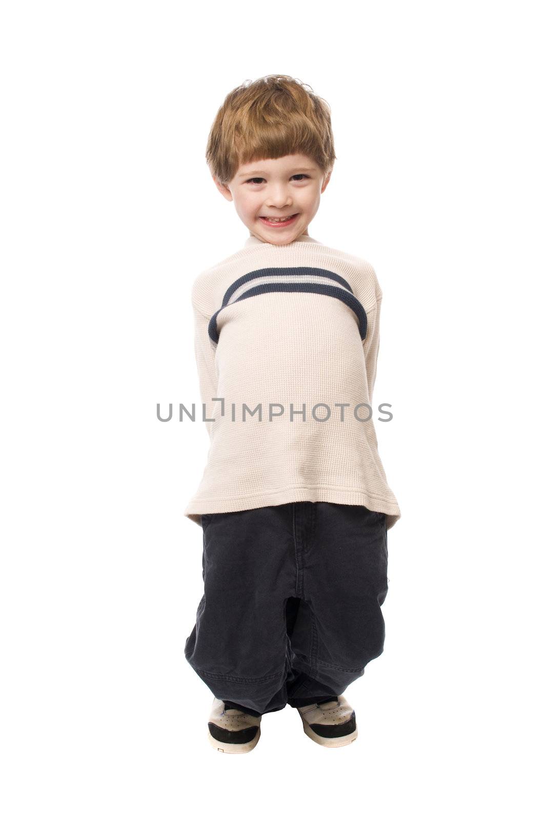 young boy just acting goofy shot on a white background