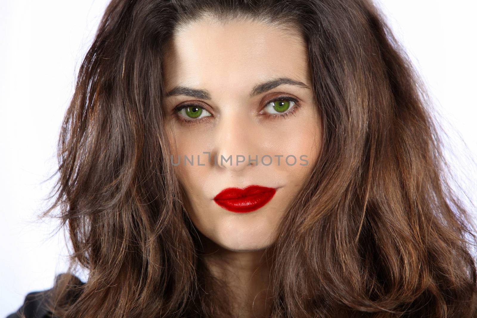 Beautiful, cool woman with green eyes and red lips