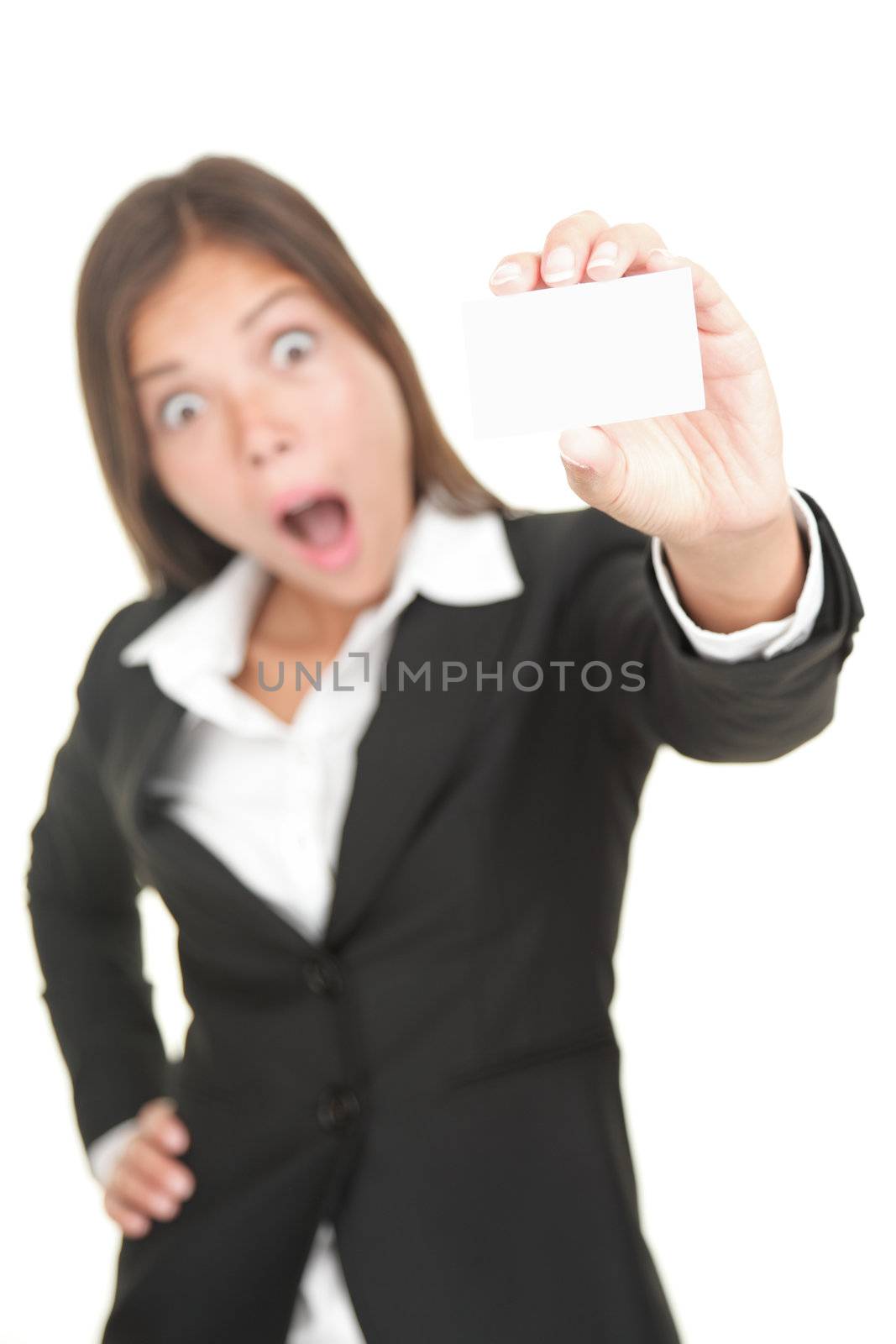 Shocked asian Business card woman isolated. Beautiful mixed chinese asian / caucasian businesswoman with her mouth open in shock. Isolated on white background.