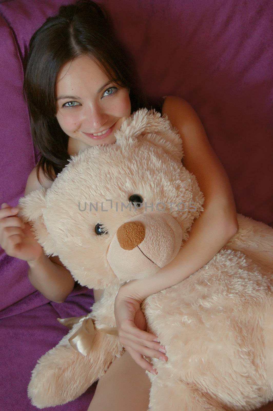 Beautiful girl with teddy bear