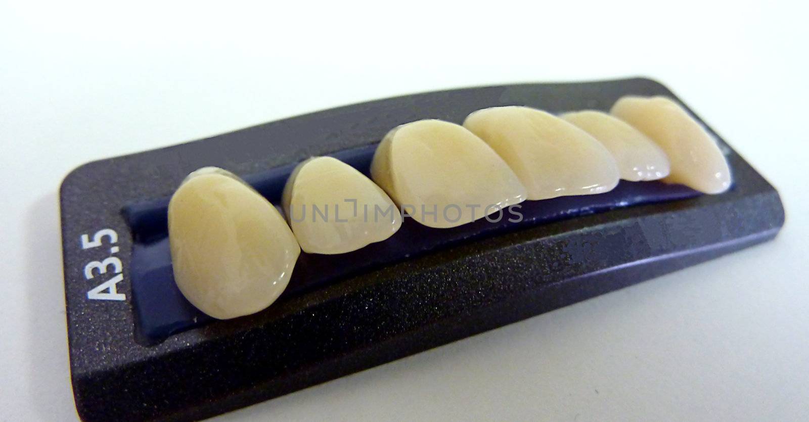 Upper yellow resin teeth on its black box to sell