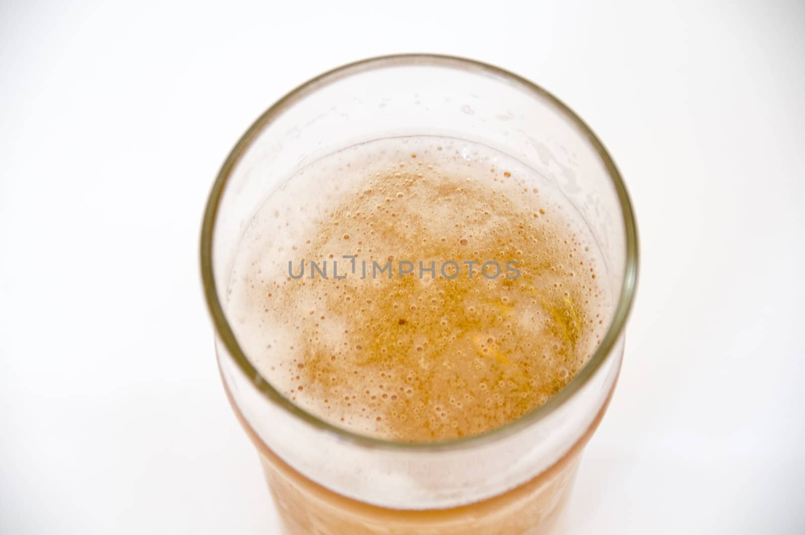 A pint of beer isolated on a white background