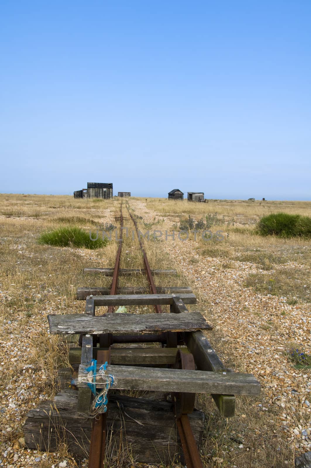 Old abandoned rail track on the beach at Dungeness