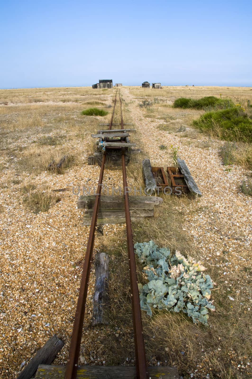 Old abandoned rail track on the beach at Dungeness