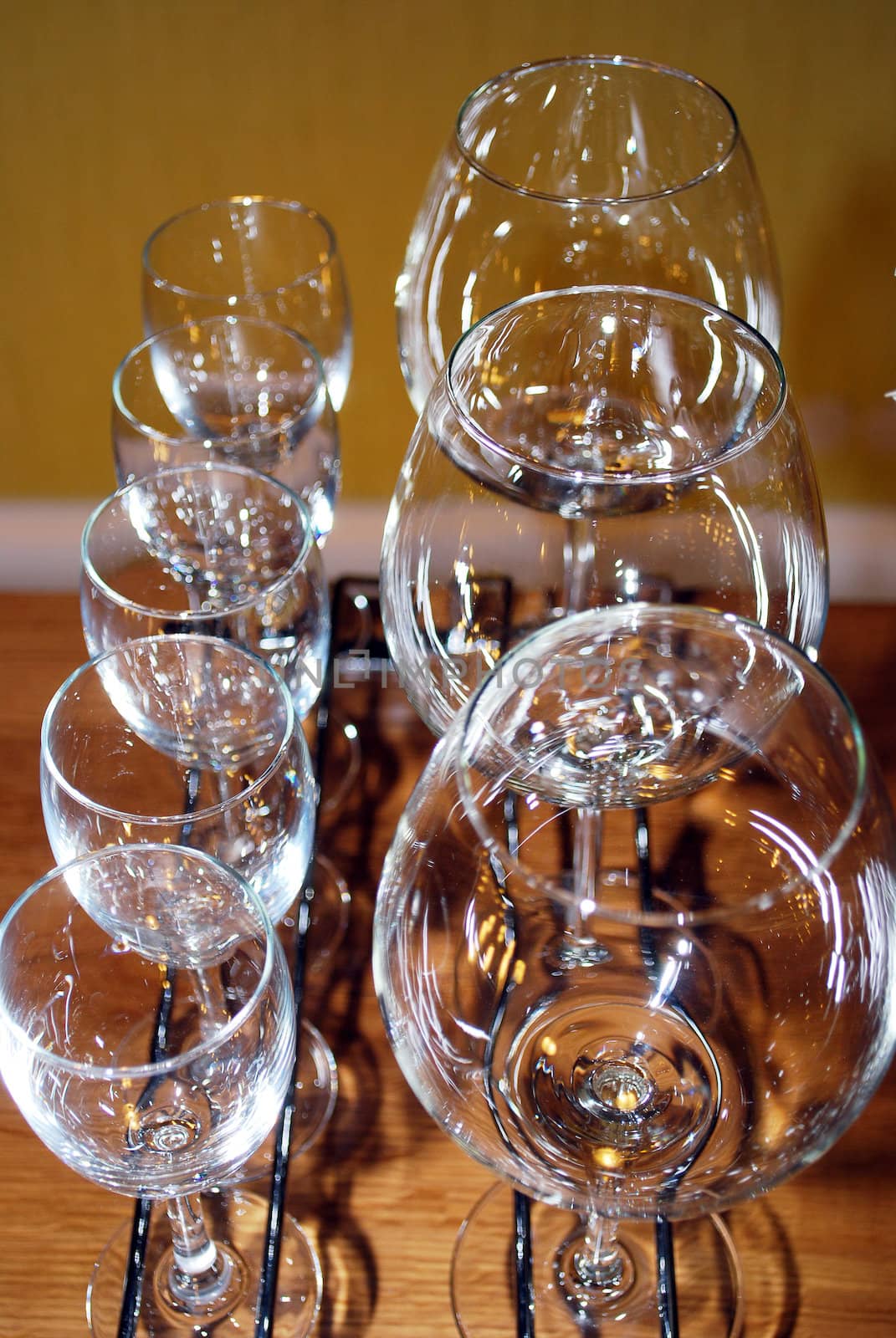 glass cups and wineglasses on a table