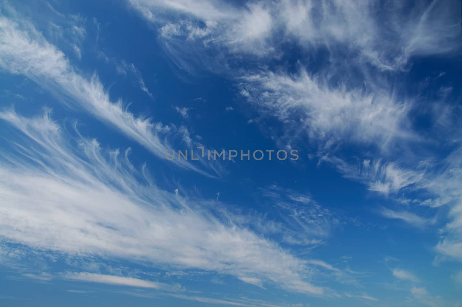 Beautiful fluffy clouds on blue sky
