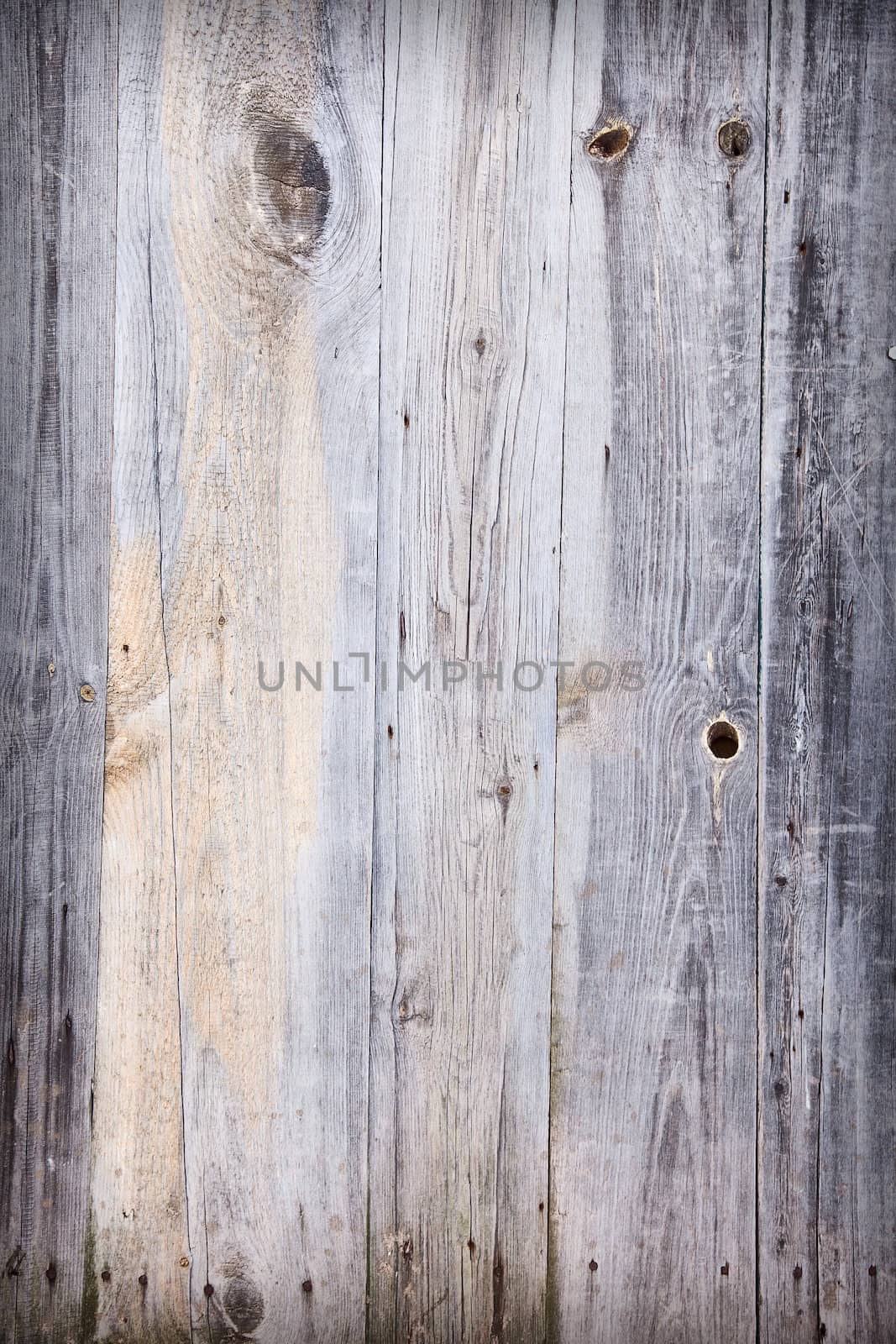 Wooden weathered dirty background with cracks and stains