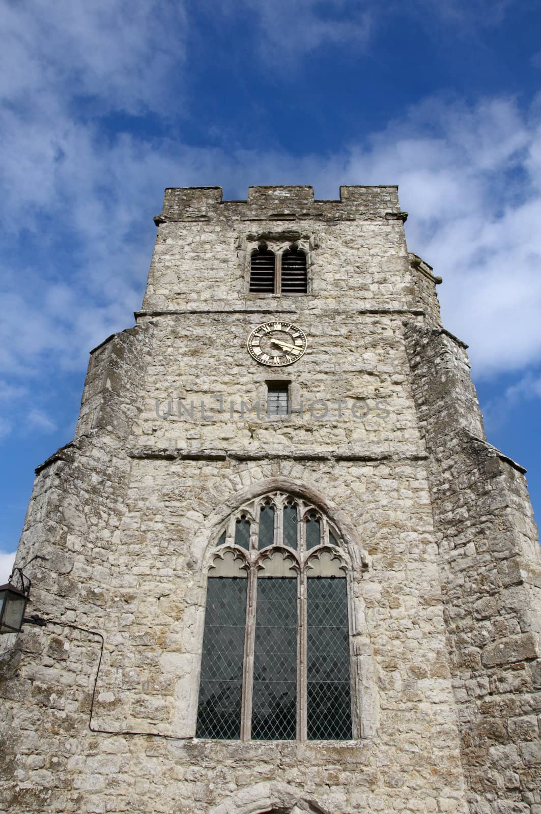 Detail of a church tower with a clock