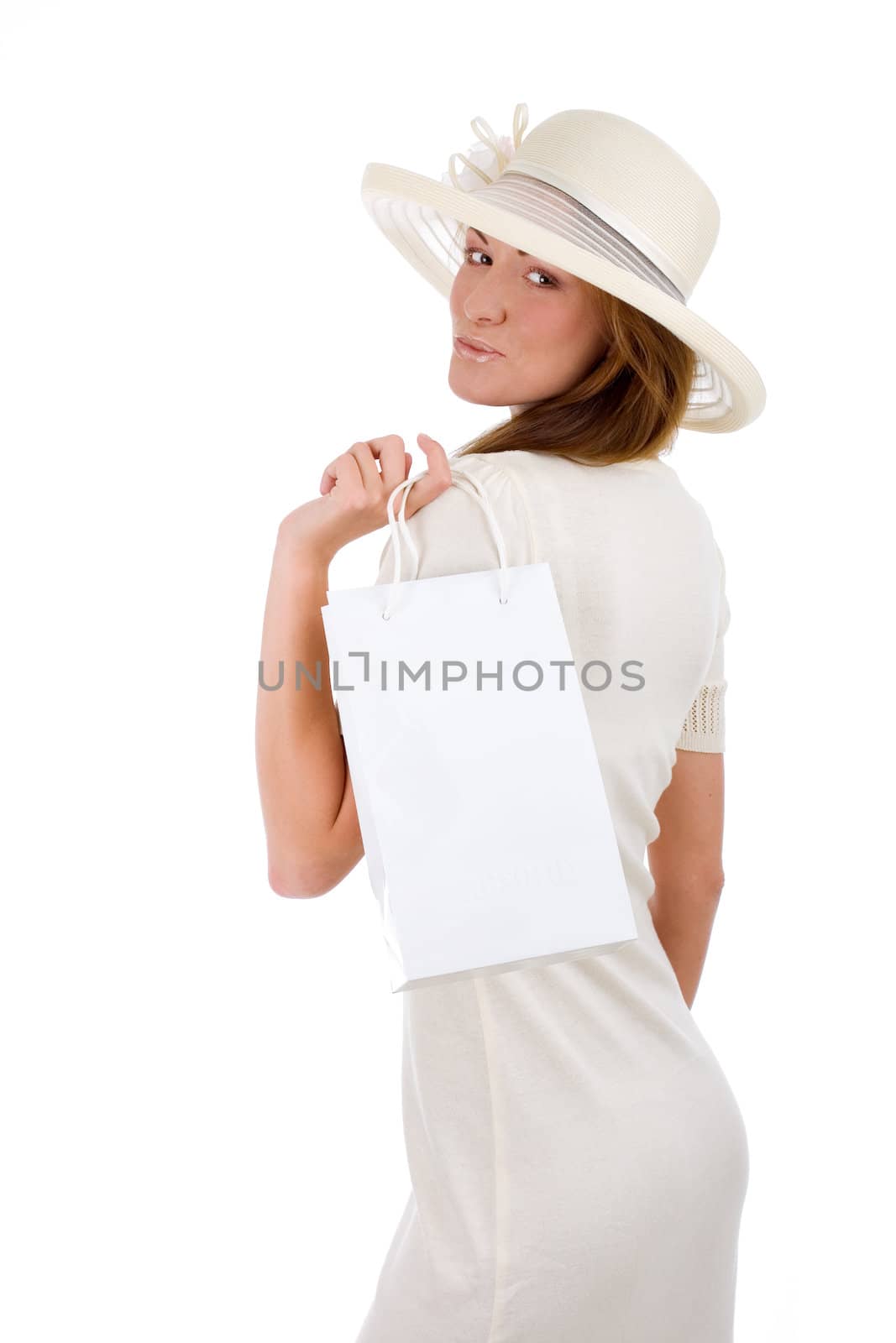 Successful young attractive woman in white dress shopping