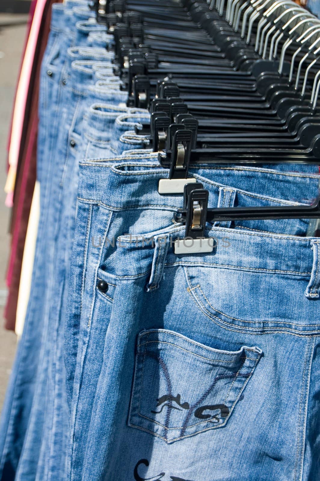 jeans for sale on a market