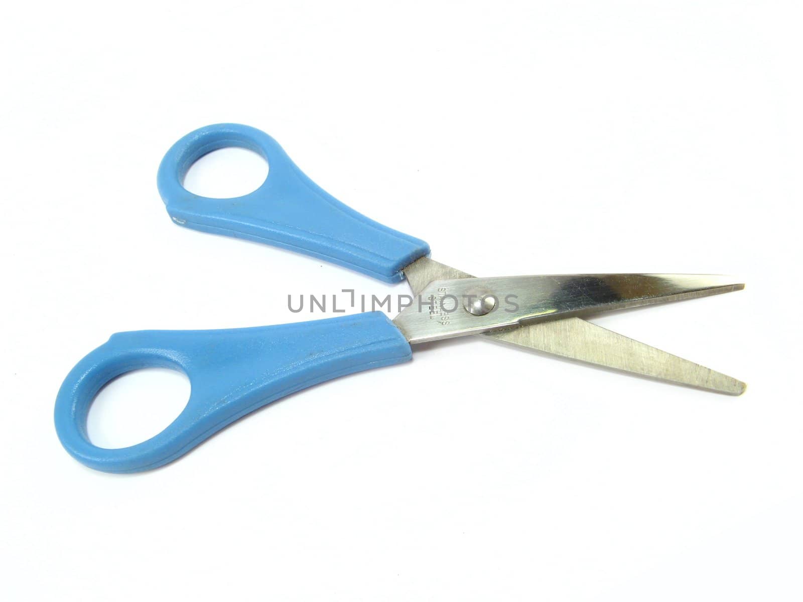 some blue scissors over a white background