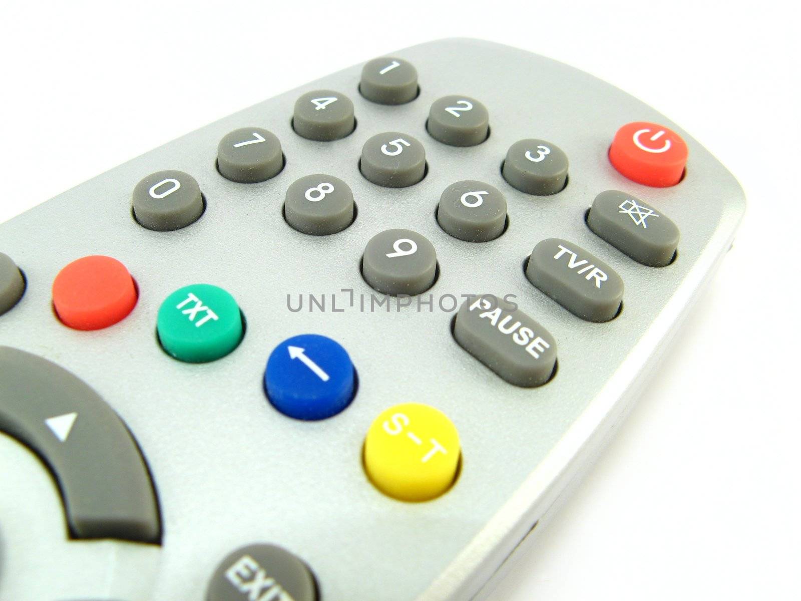 close-up of a remote control over a white background