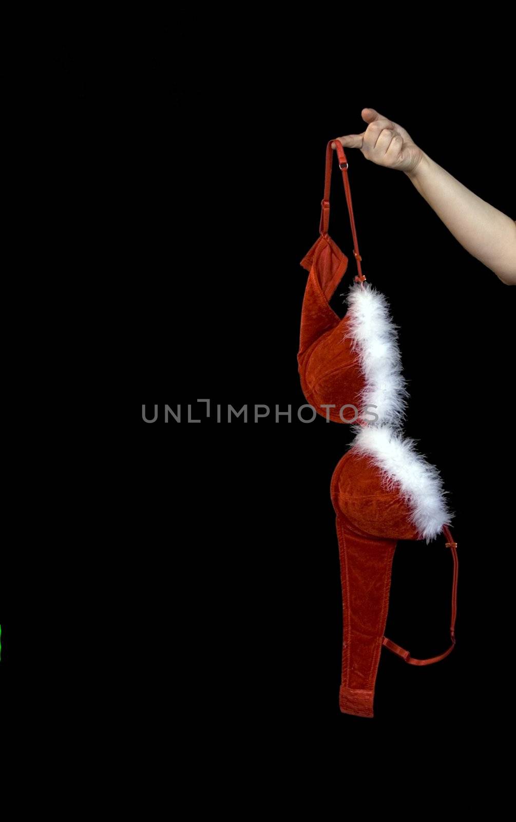 Lady holding out a fuzzy red bra