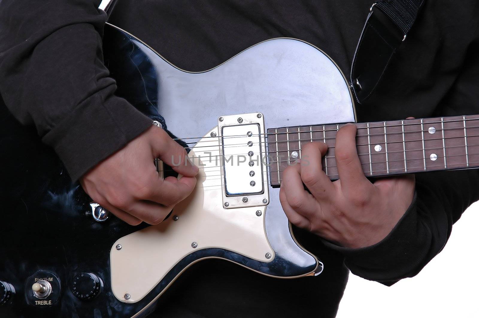 hands playing guitar close up