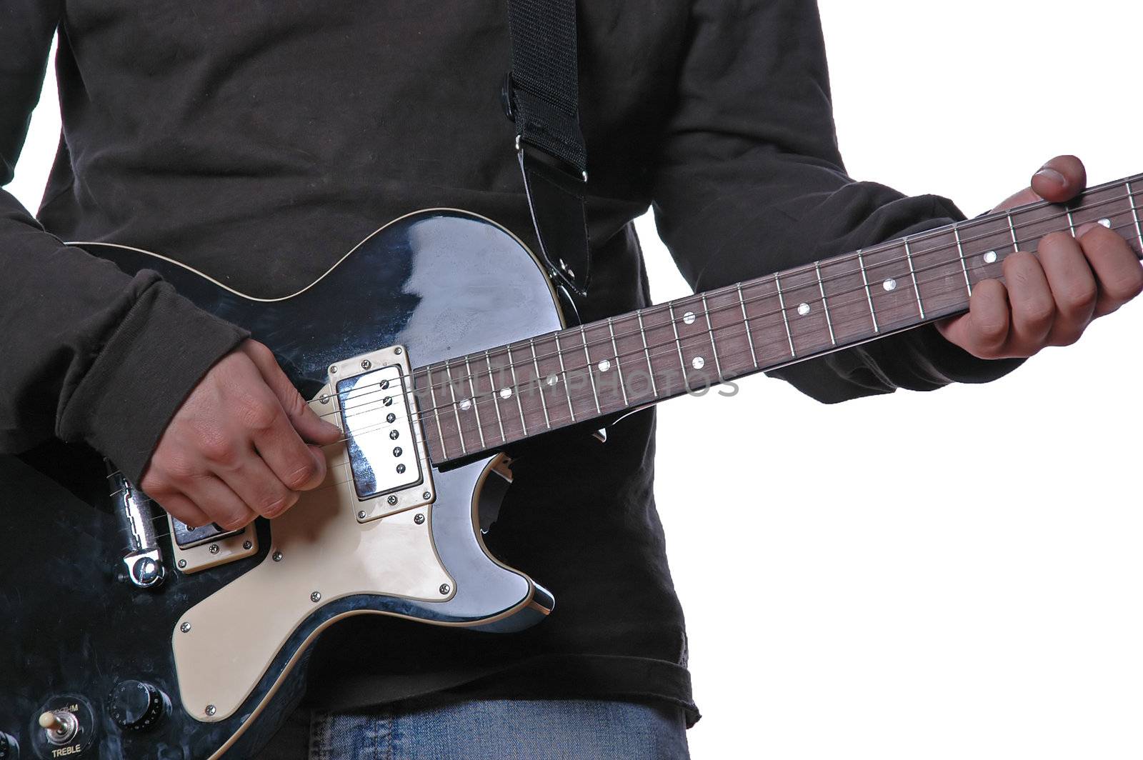 Close-up view of guitar and musician's hands by raalves