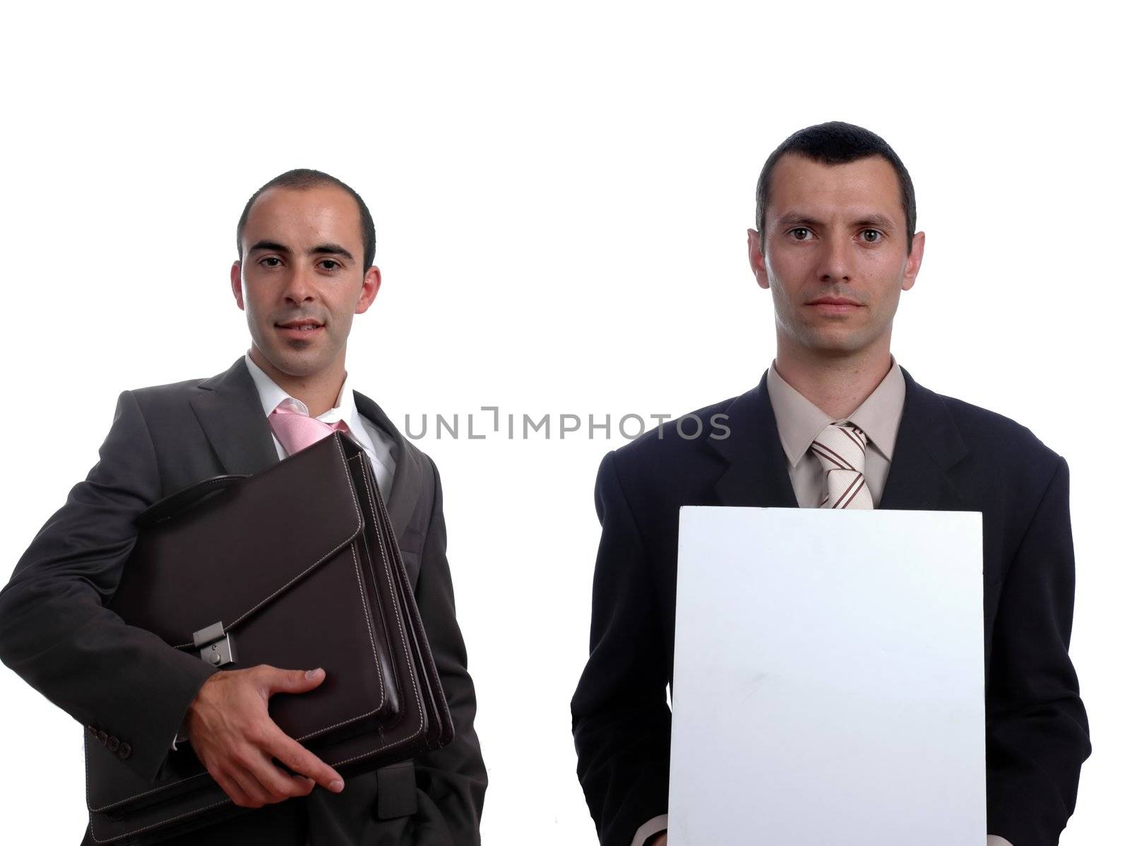 businessman holding one folder and another holding white board by raalves