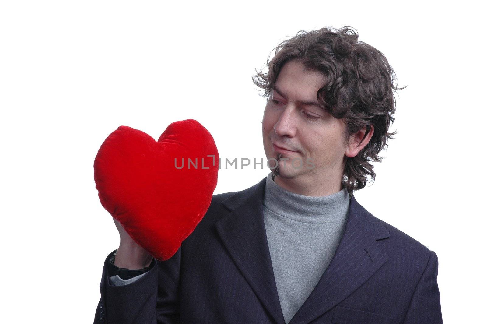 happy businessman holding heart in hands