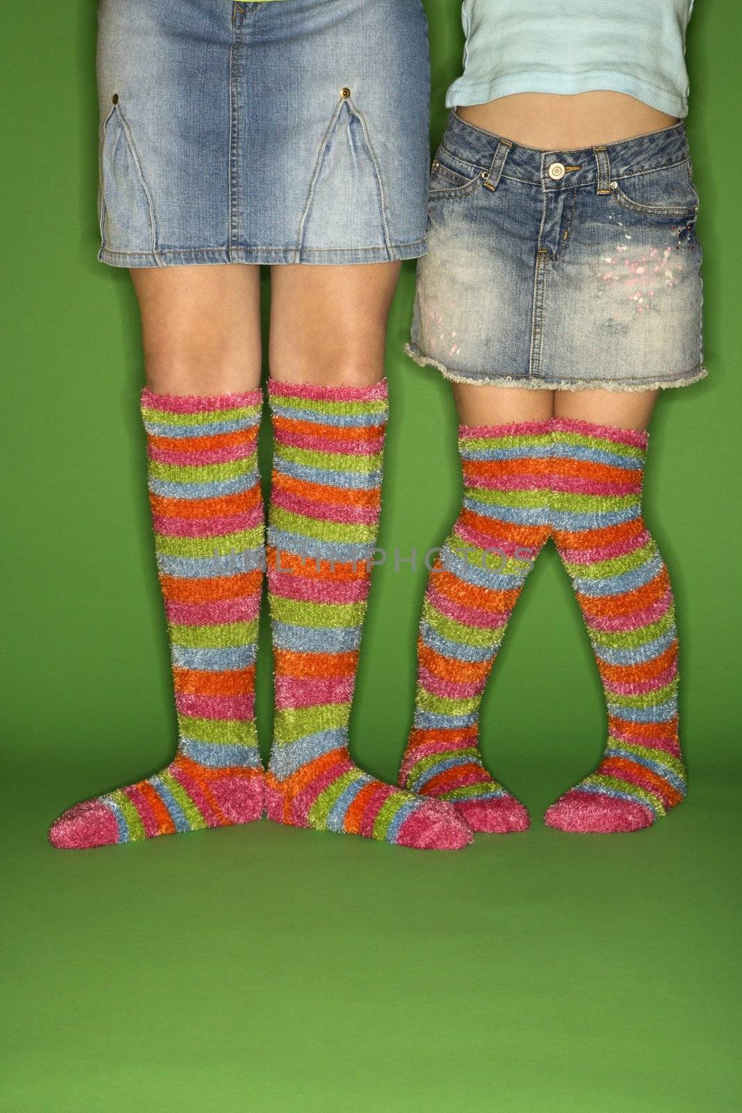 Caucasian female children wearing striped socks.
