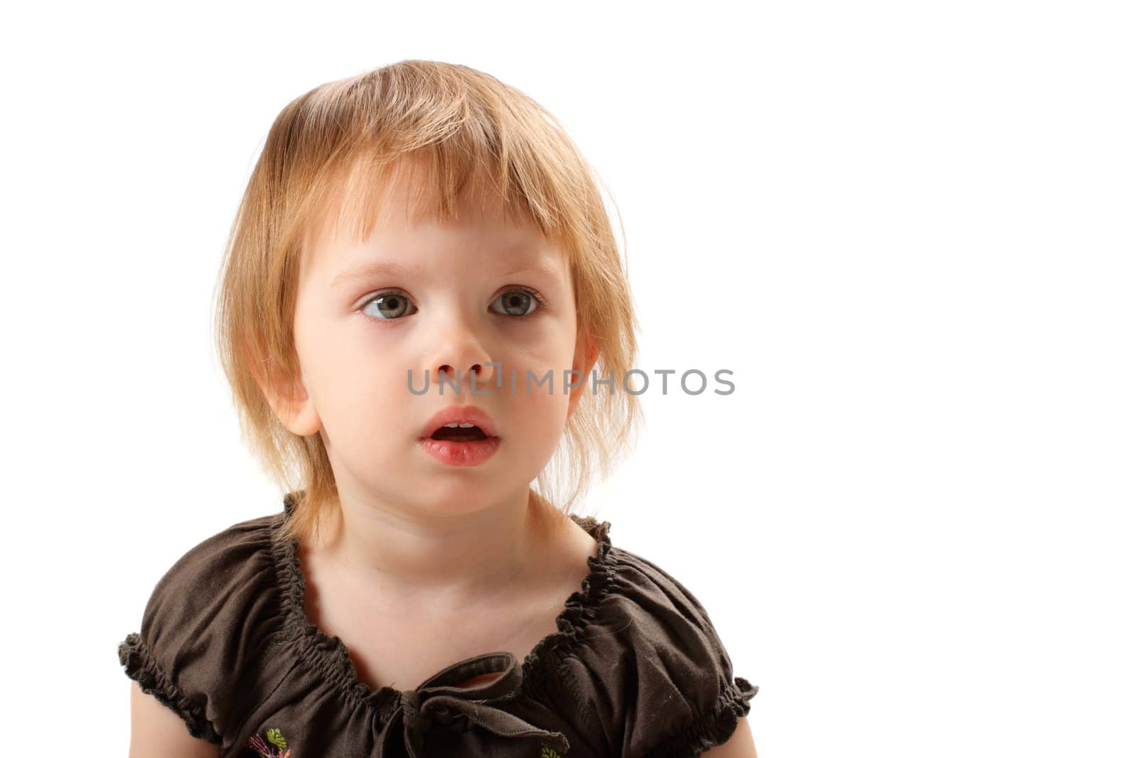 Little beauty girl terrifically wonder and open her mouth. She seeing smb interesting from the right of photographer. 
