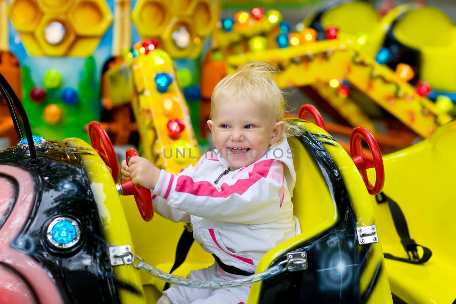 child in park of attractions