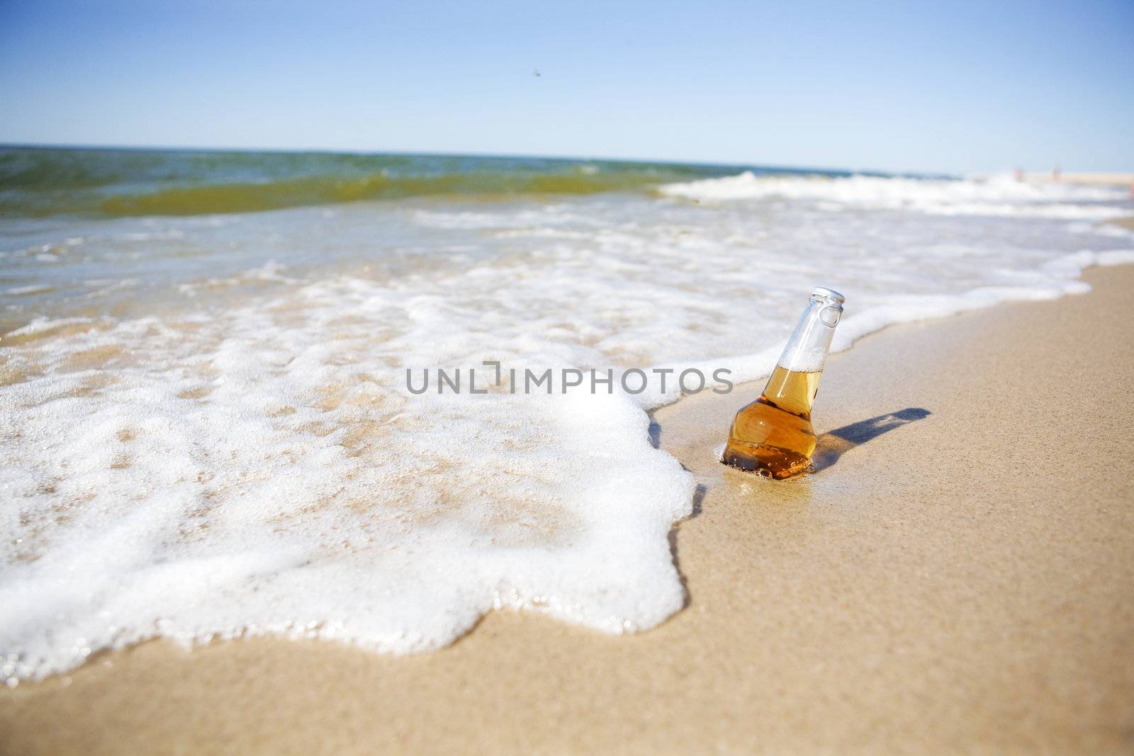 Bottle of Beer on a Beach