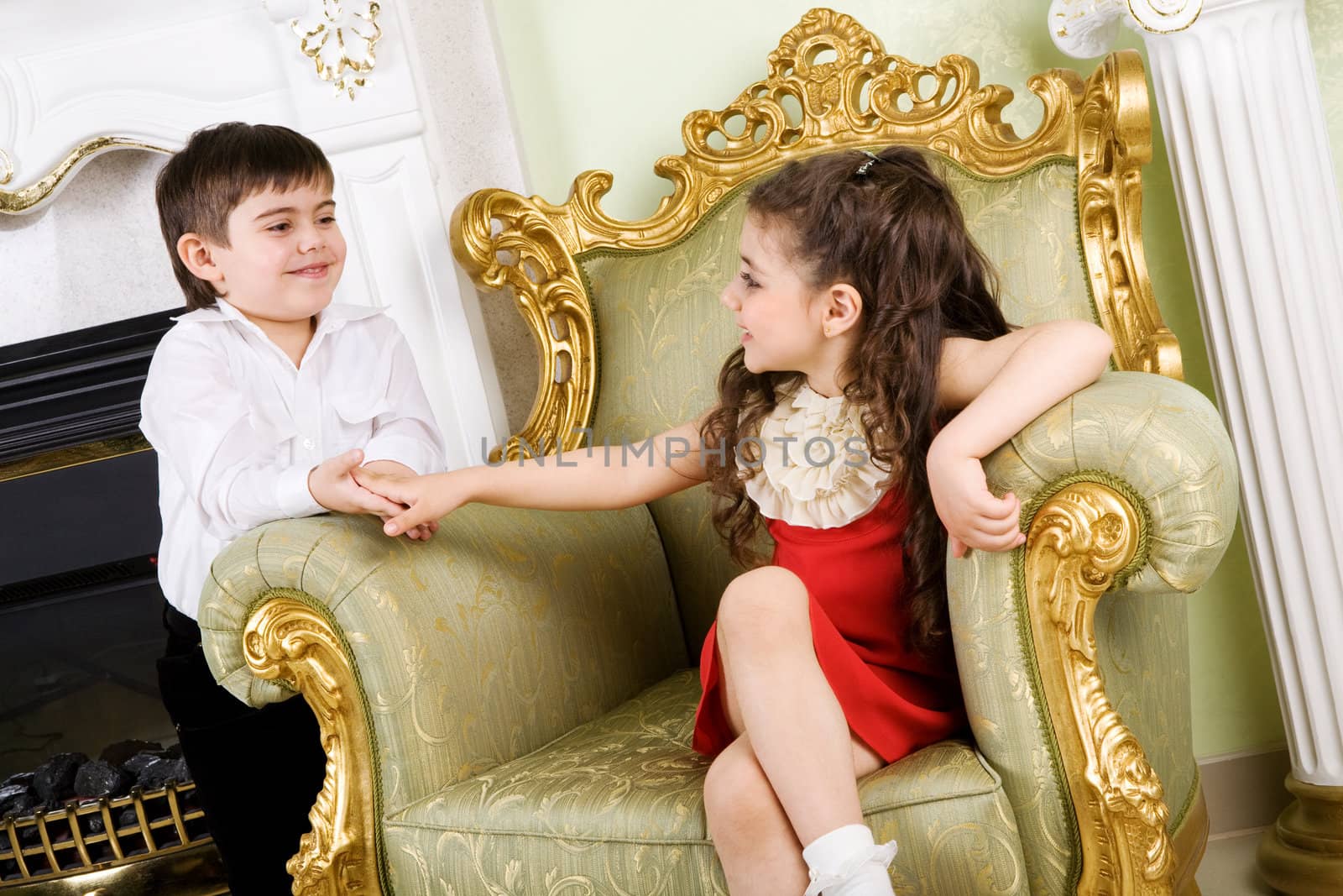 children lone to another in the room