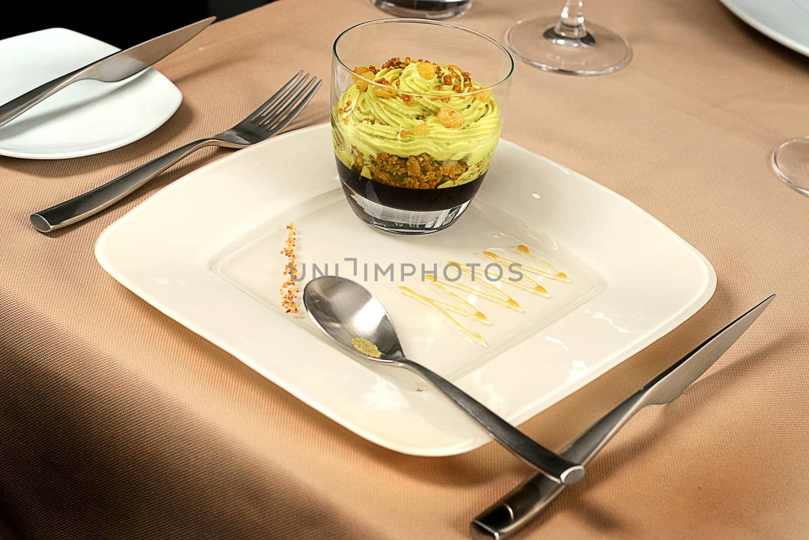 Artistic Dessert with ice-cream and raisins