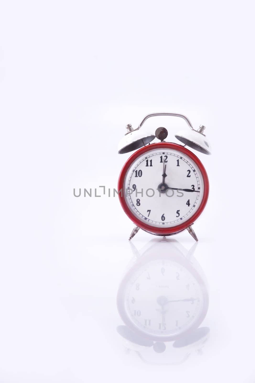 vintage ALARM CLOCK isolated on white background