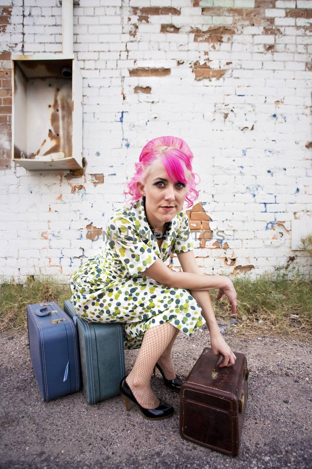Woman with Pink Hair and a Small Suitcases by Creatista
