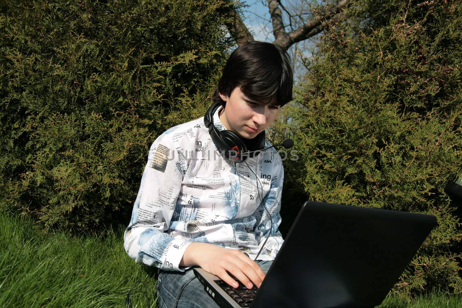 Closer view of a student and computer
