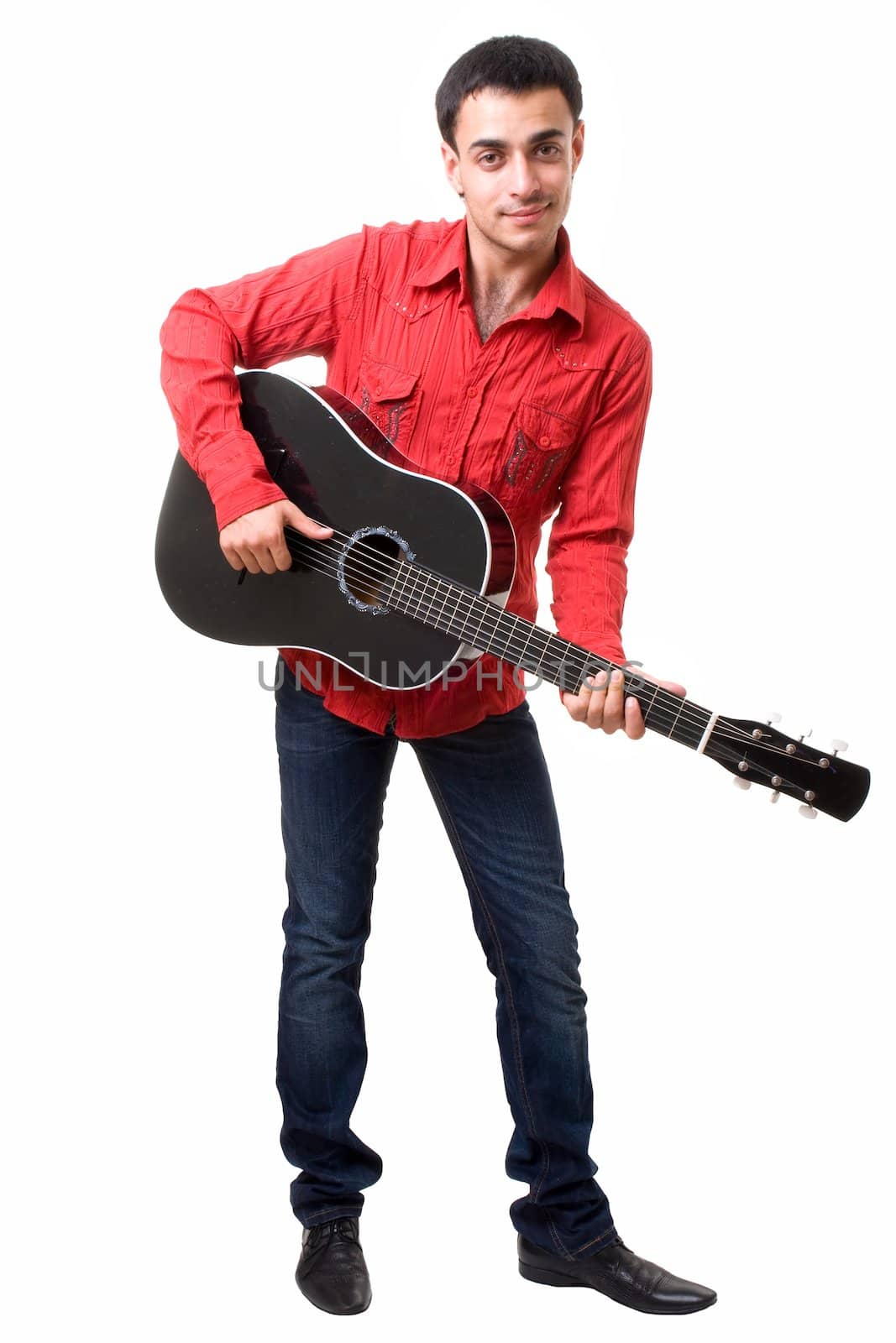 Guitarist. The man in a red shirt with a black guitar on a white background.