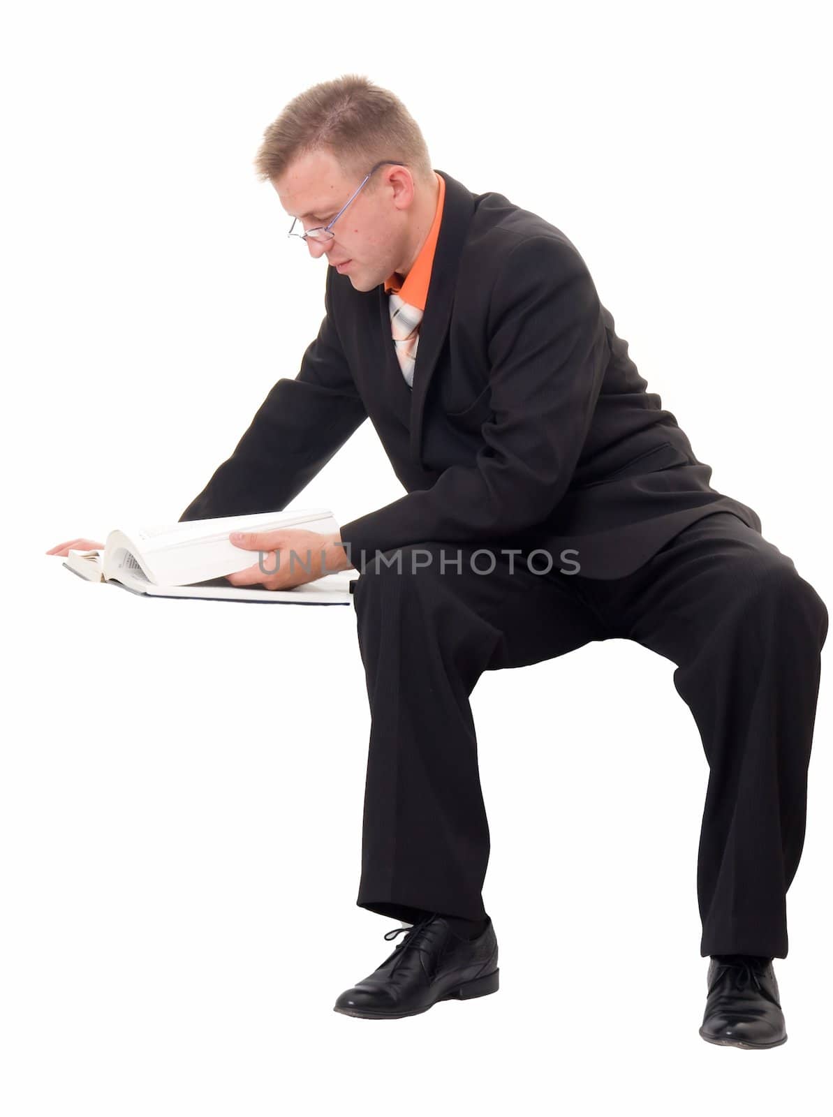 young businessman reads the book on a white background