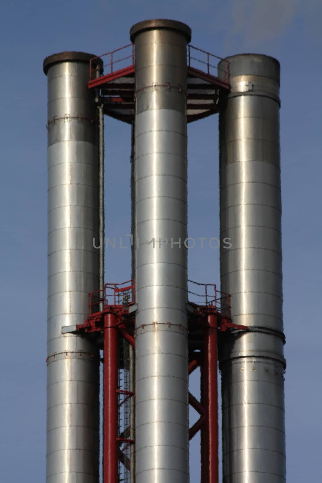 Group of steel chimneys of a gas factory