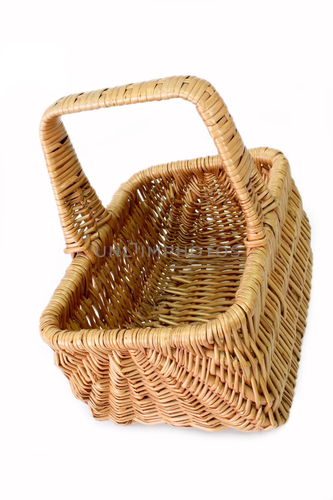 Plaited basket on bright background