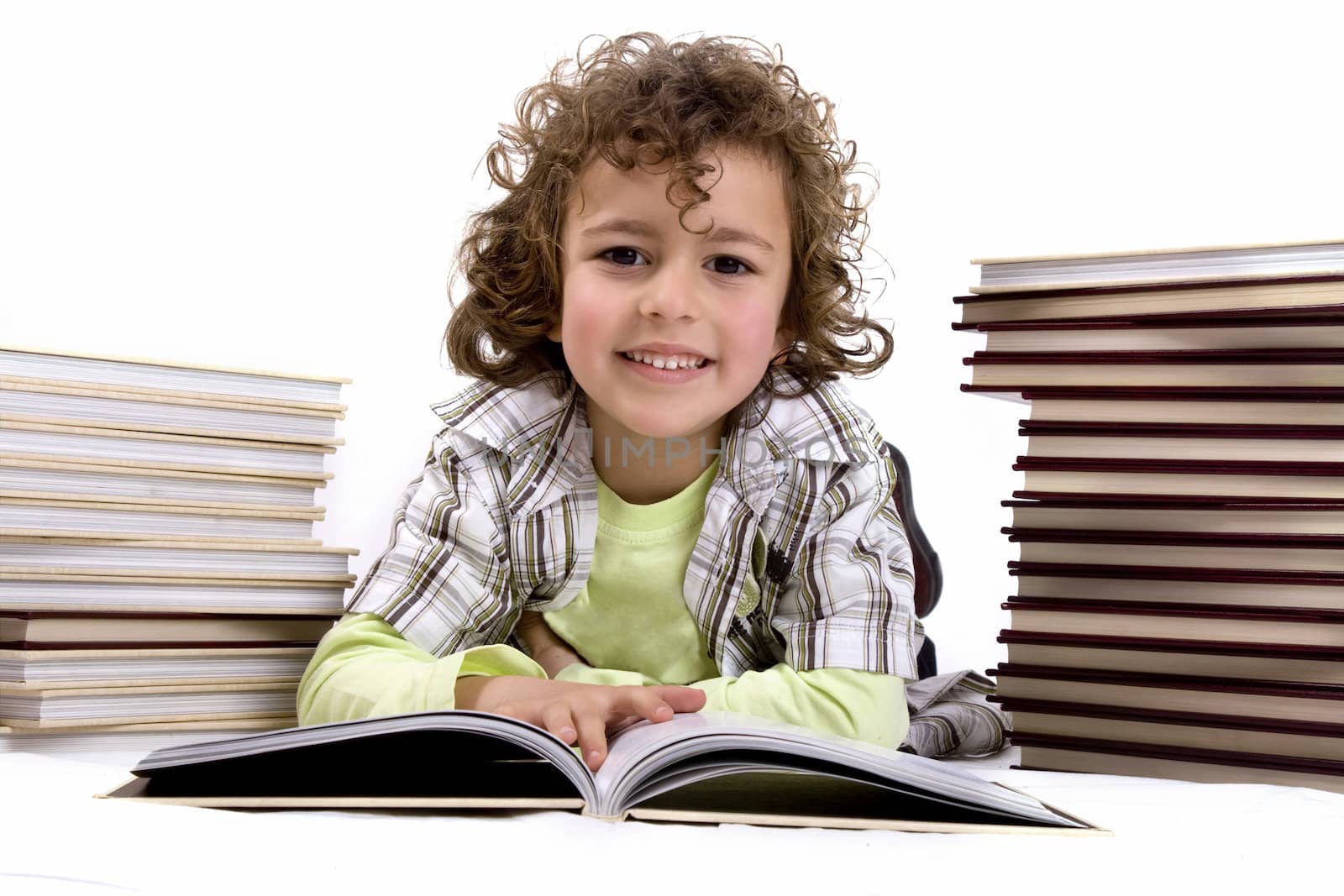 Kid with books on a white background