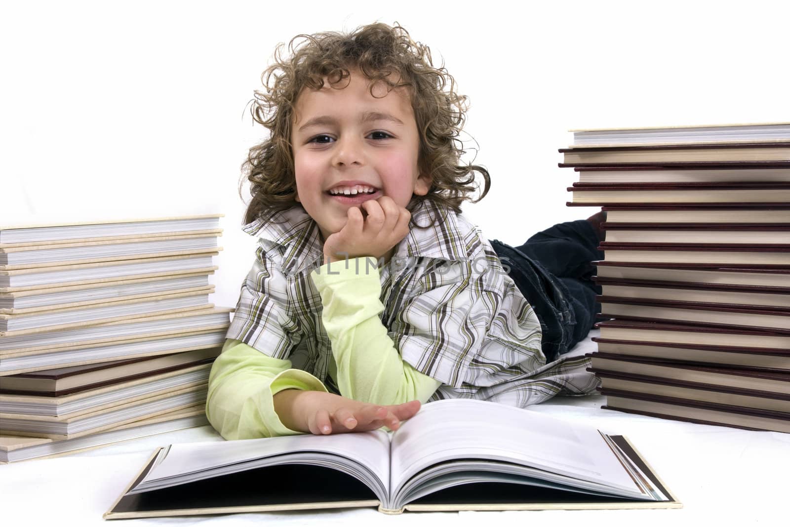 kid with books by jfcalheiros