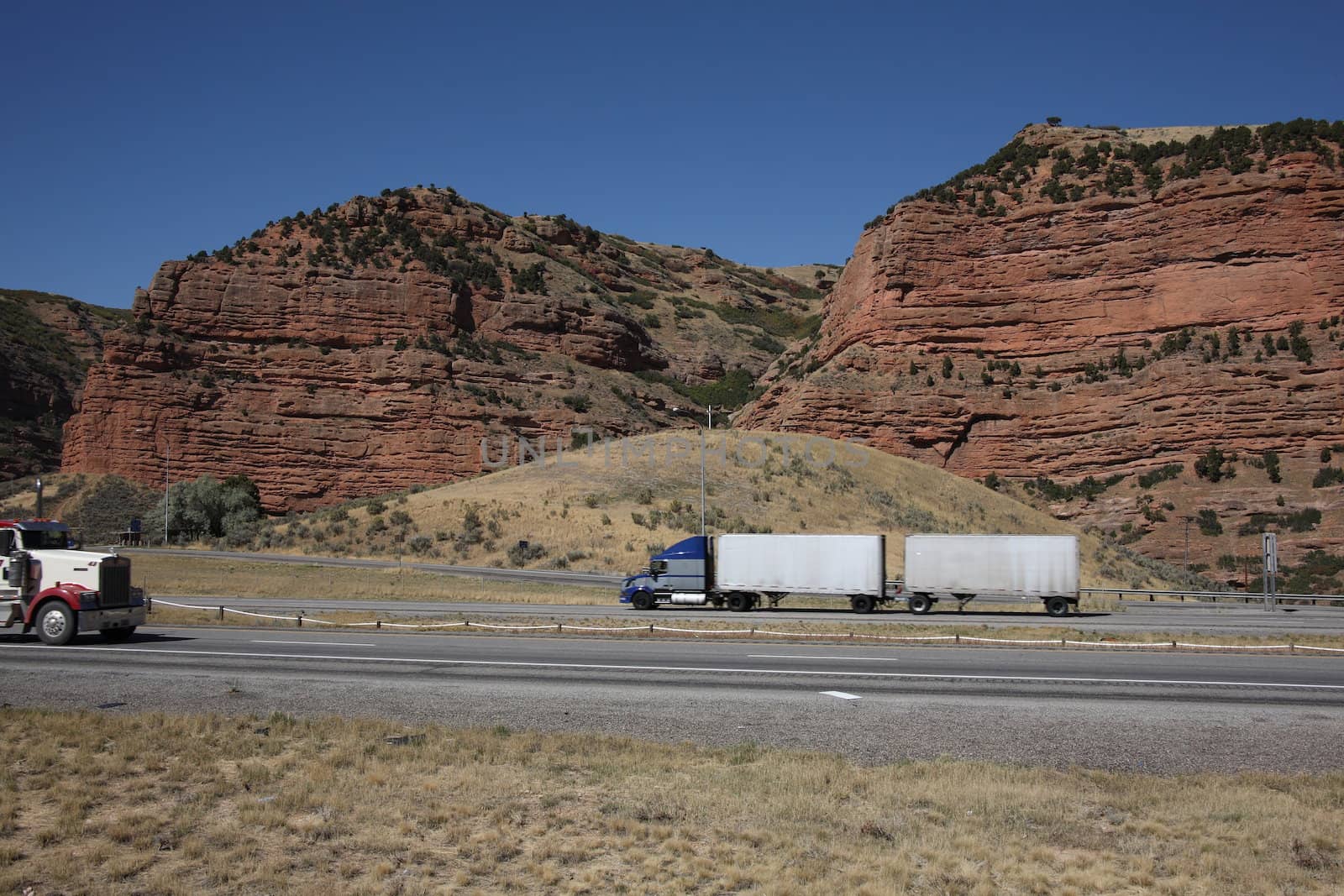 Trucks climb the Utah hills