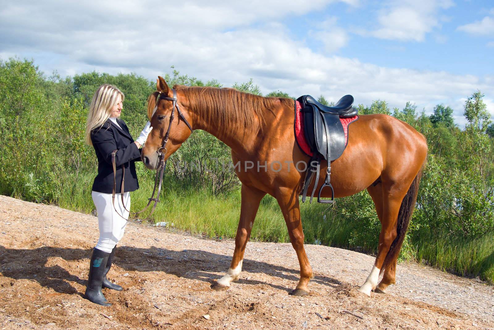 beautiful girl and her handsome horse.Friendship