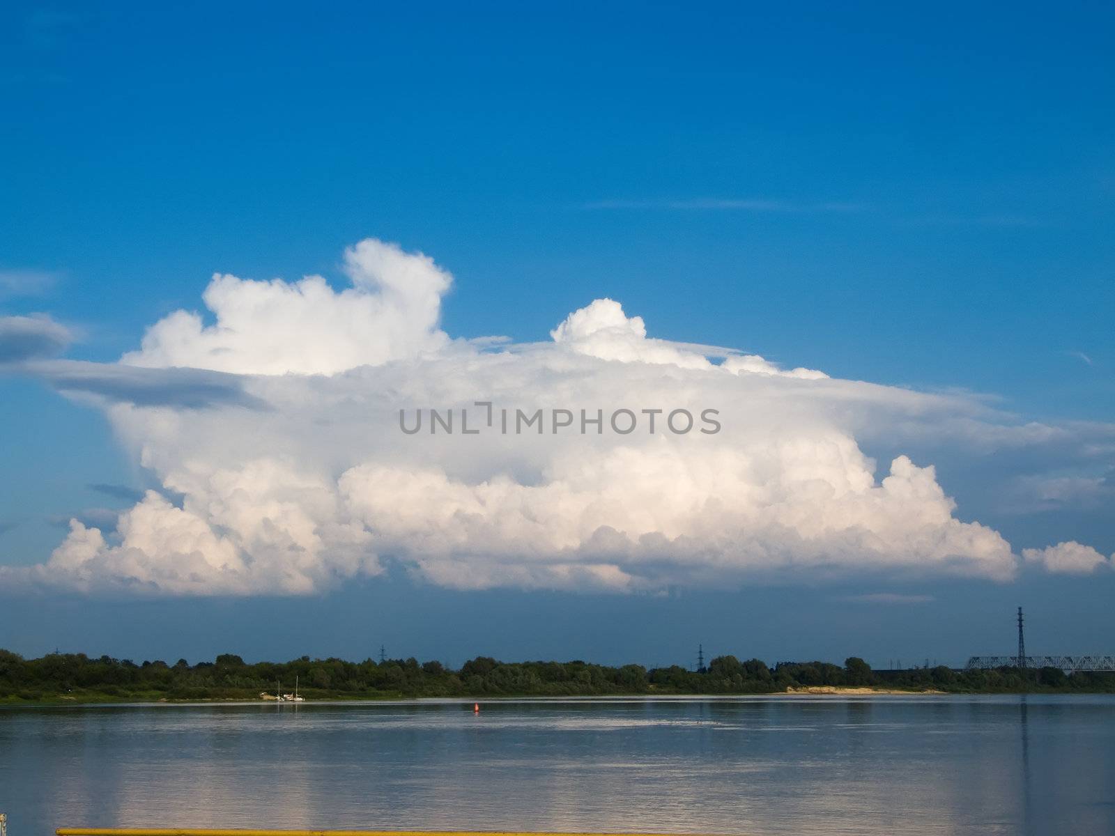 Blue sky and white clouds on sunny day. by Jim