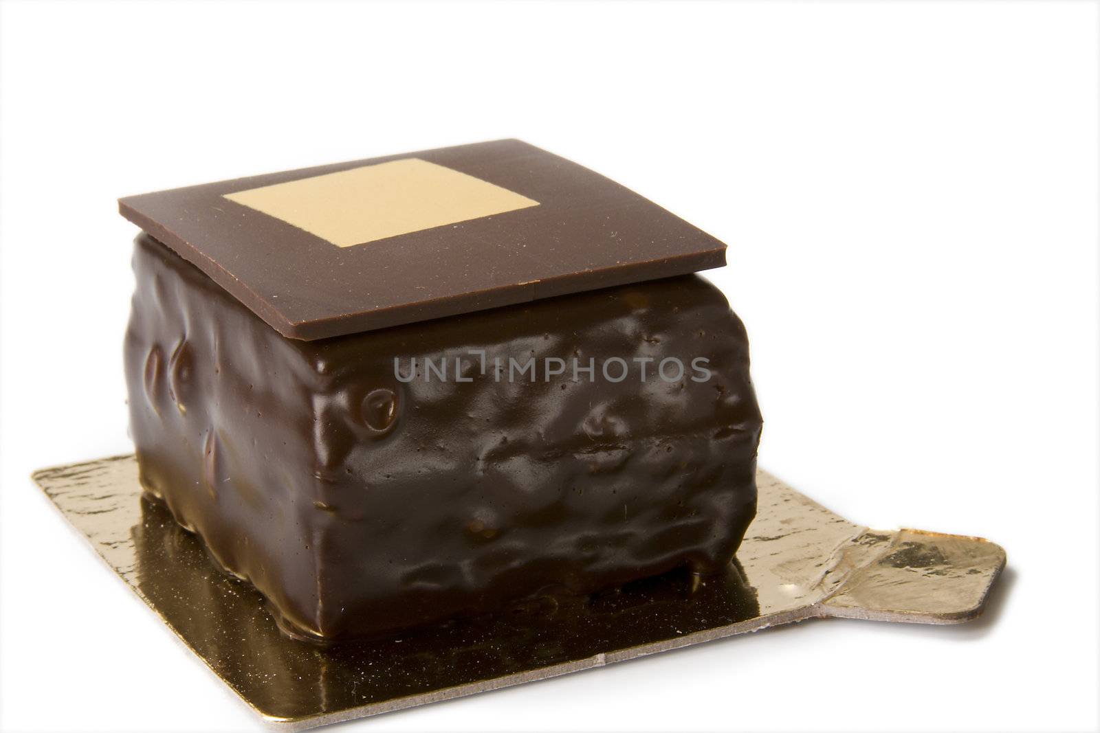 Delicious chocolate cake on a white background