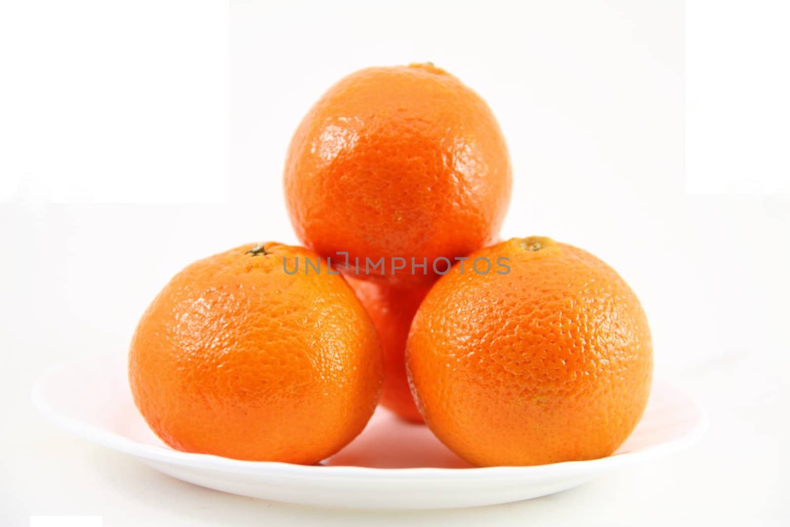 Ripe oranges isolated on a white background..

