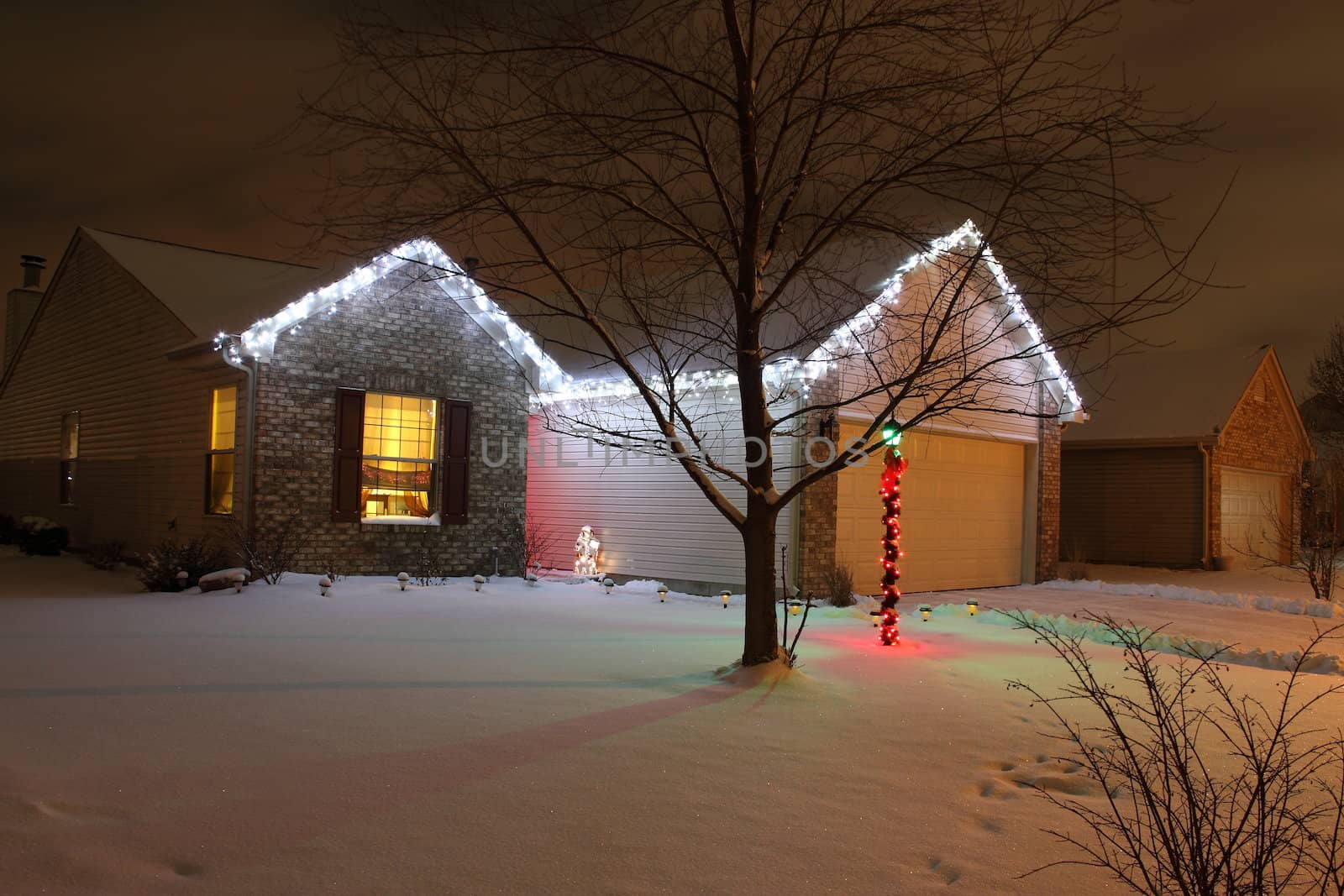 A home decorated with LED Christmas lights