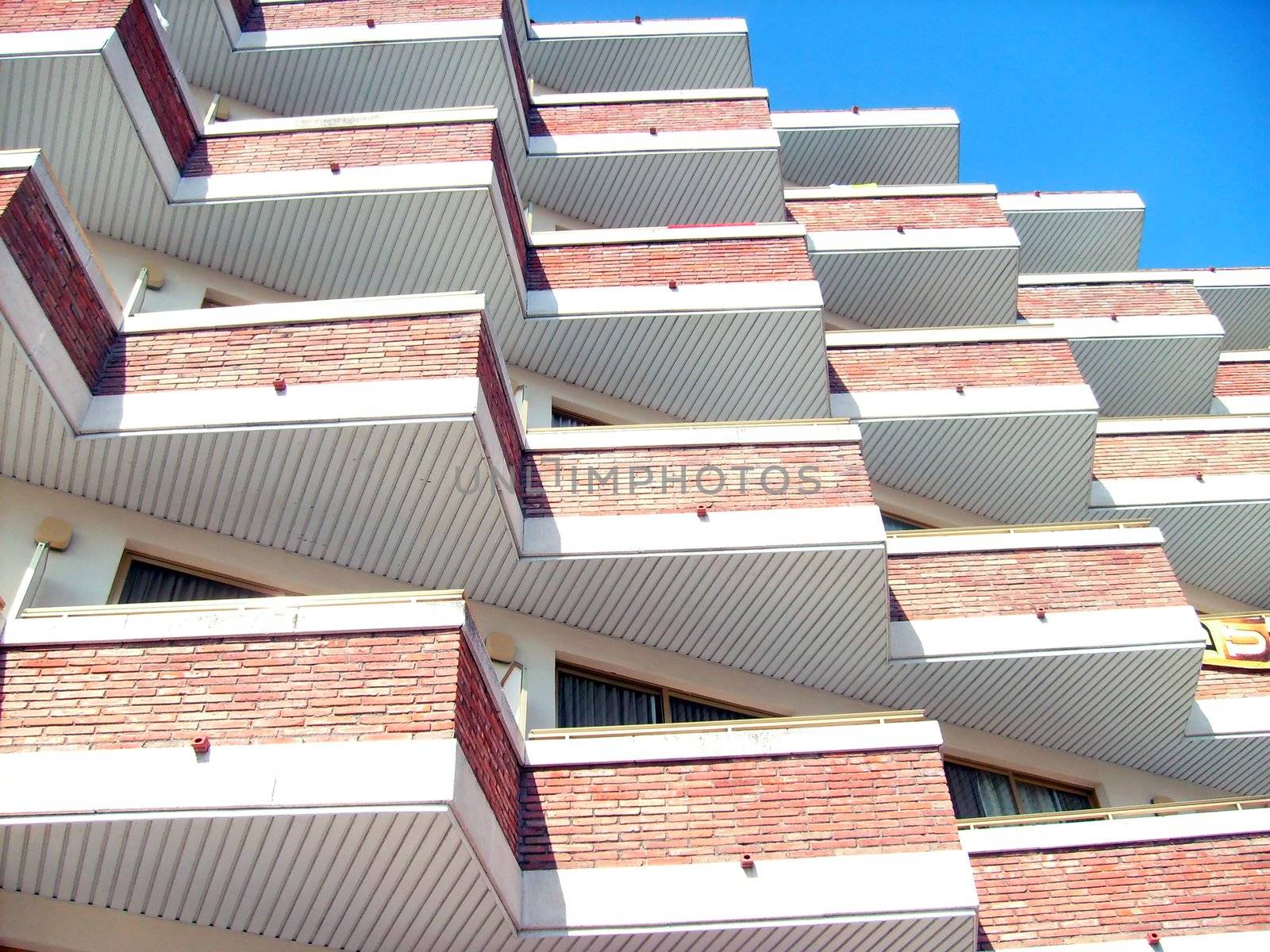 General view of exterior of lbalconies on Spanish tourist hotel.